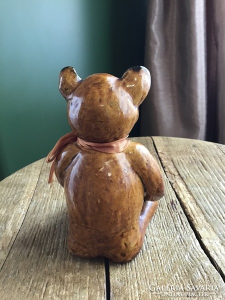 Old ceramic teddy bear statue