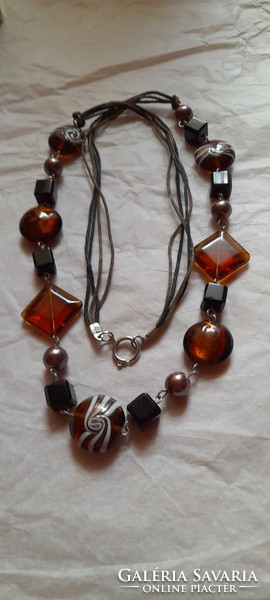 Necklace with brown glass lamp beads and plastic beads