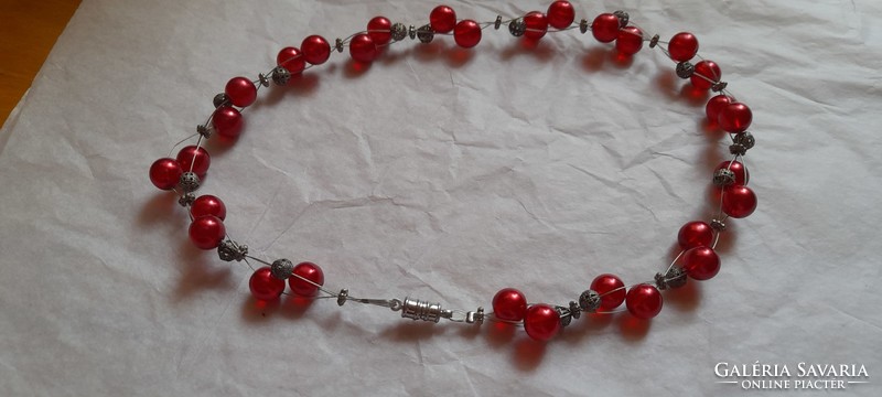 Necklace with red plastic beads and metal beads