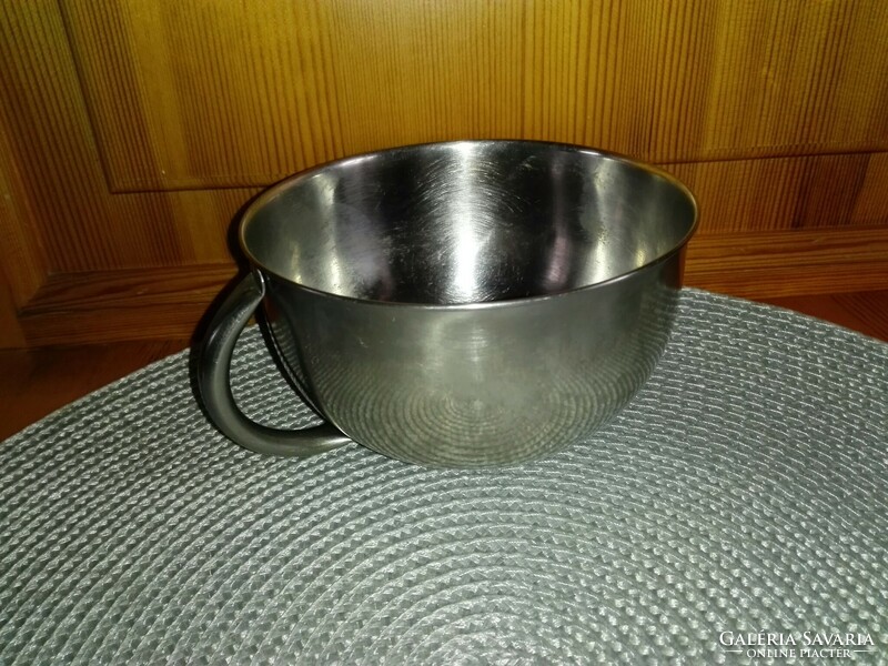 Stainless steel giant cup.
