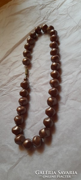 Retro necklace with brown glass beads.