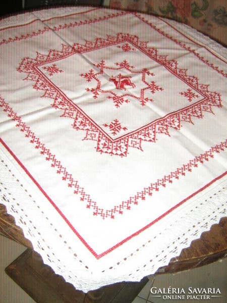 Beautiful red tablecloth with cross-stitch embroidery