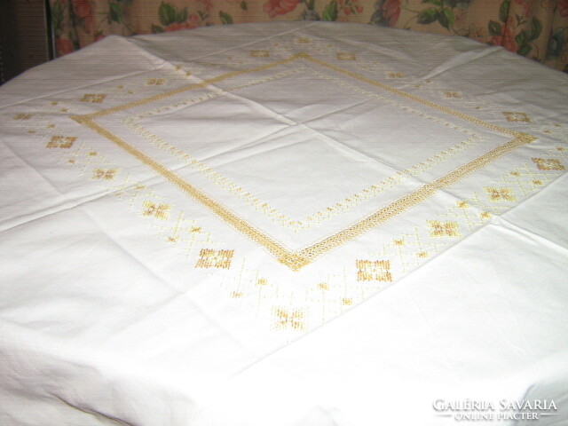 Beautiful and elegant azure tablecloth with cross-stitch embroidery