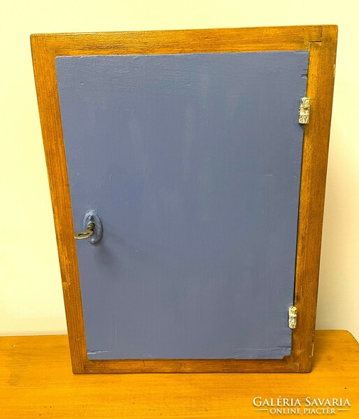 Old wall medicine or toilet cabinet with shelves, retro,