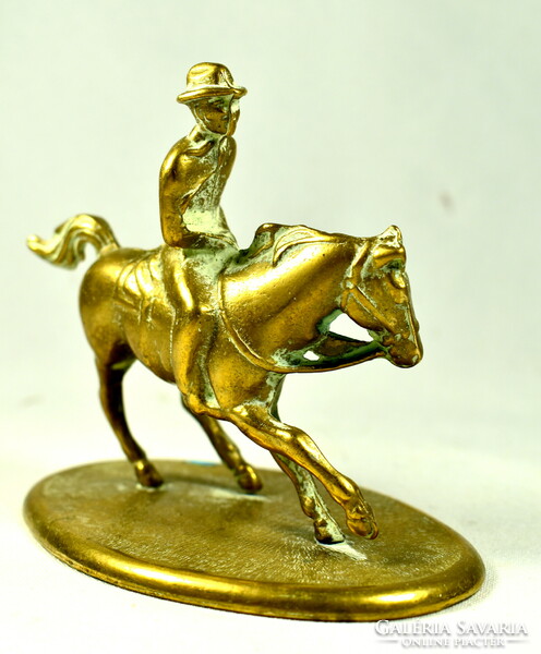 On the back of a horse ... Solid copper equestrian figure!