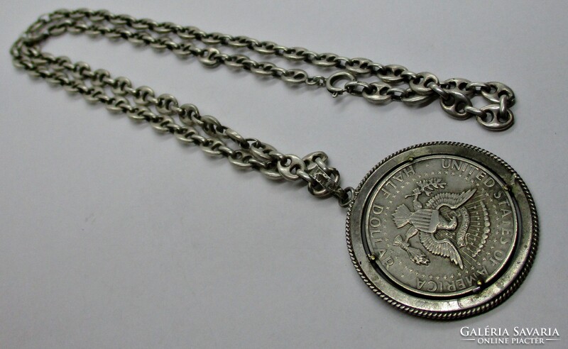 Kennedy half dollar in silver pendant on thick silver chain