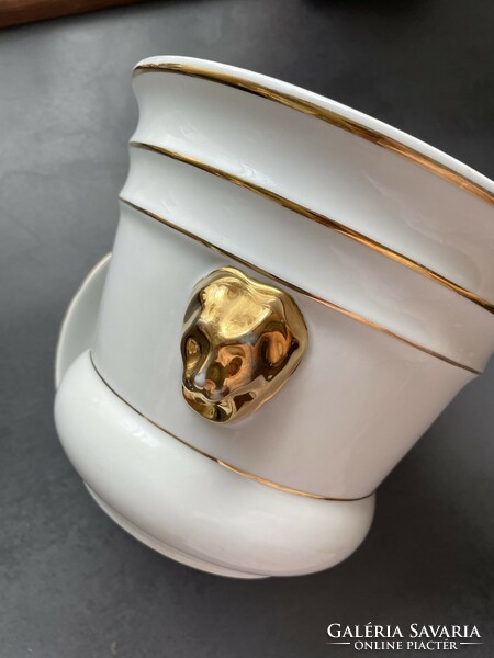 Very nice porcelain bowl with golden lion head ears