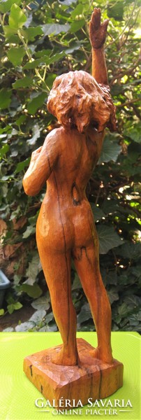Carved wooden standing female nude