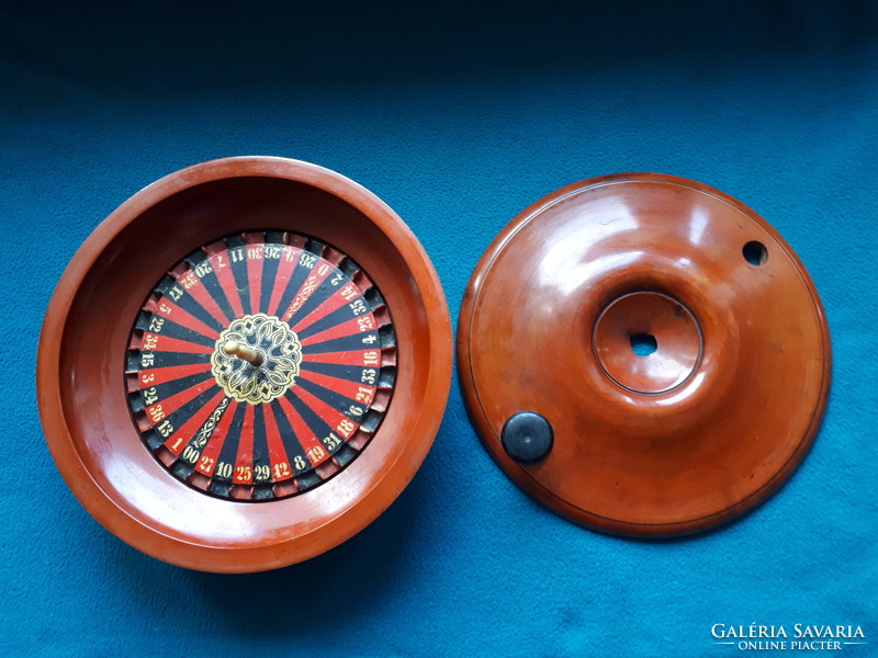 Antique wooden roulette wheel from the end of the 19th century