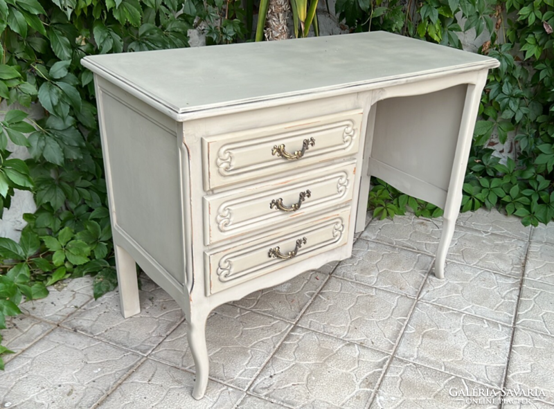 Vintage, shabby gray desk in neo-baroque style with 3 drawers
