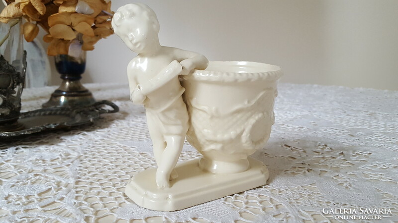 Ceramic vase with cherubs and little boys