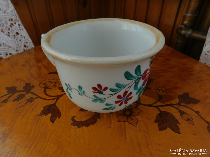 Old coma cup with floral pattern