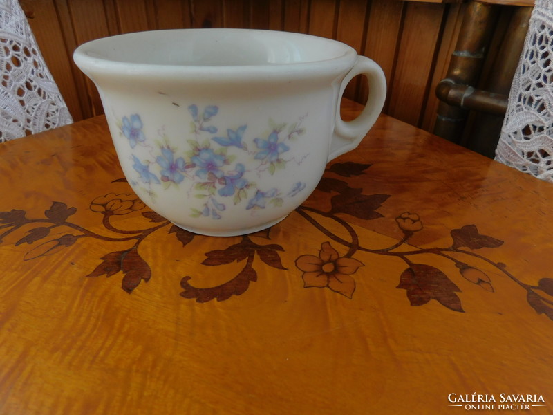 Old coma cup with floral pattern, perfect