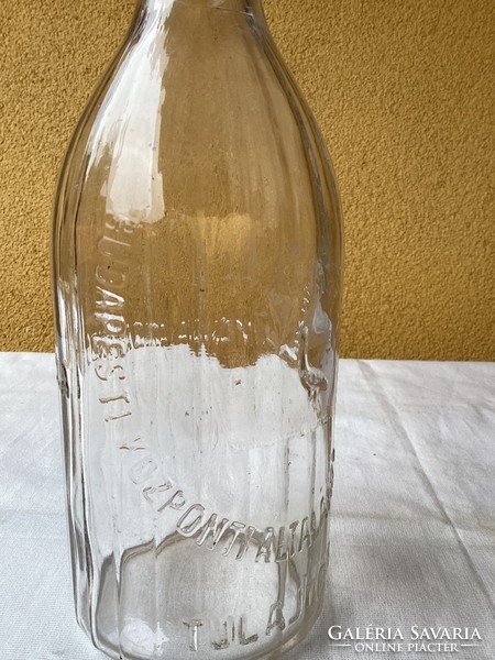 An old one liter milk bottle.