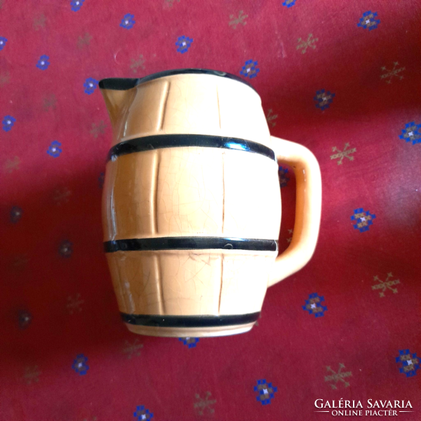 Old barrel-shaped ceramic wine jug and glass set