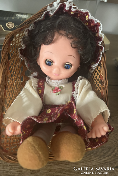 Charming twinkling doll in a hanging basket