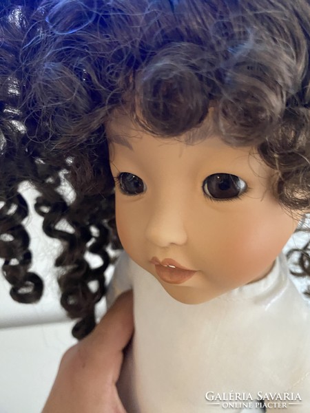 An artist doll with an incredibly beautiful face is an artist doll