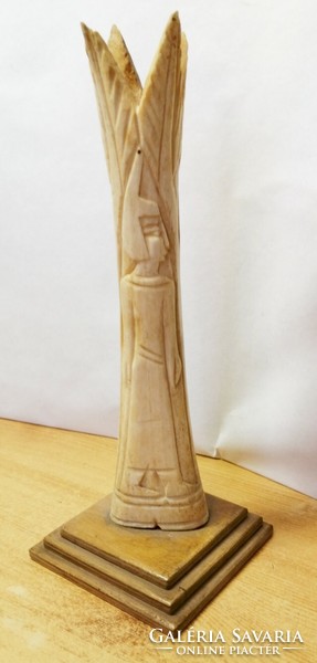 Bone carving with Egyptian deity. Unique handcrafted artefact