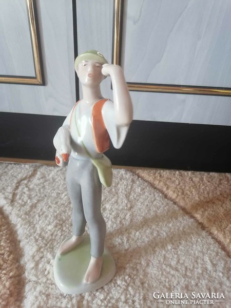 Hand-painted drasche porcelain figurine of Matyi with a goose