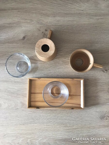 2 glass cups with wooden coasters