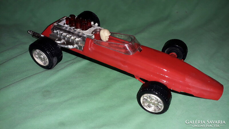 Old vinyl - metal sheet bottom flywheel shape - 1 toy car 28 cm tall as shown in the pictures