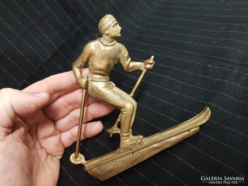 Old copper skier plaque or award