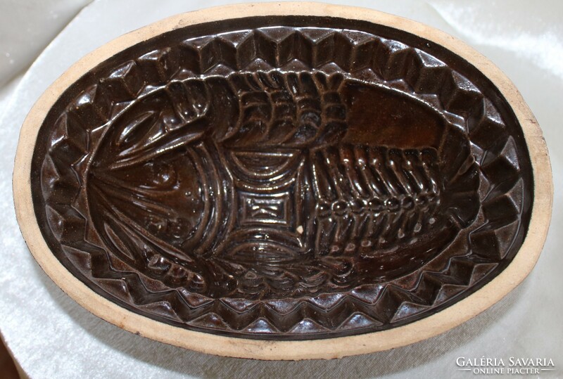 Decorative ceramic bowl with a folk motif for making butter