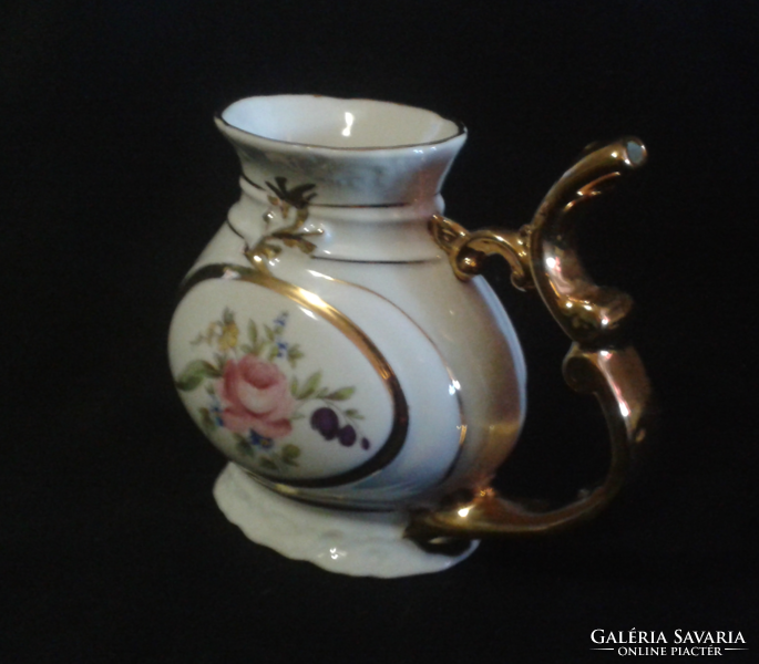 Porcelain jug with flower pattern, gilded handle