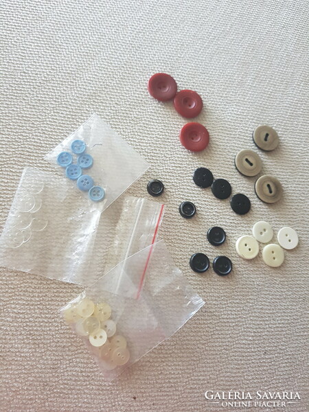 46 assorted buttons from the 80s