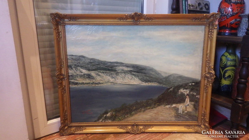 Signed oil-on-canvas landscape riverside painting with dog figure