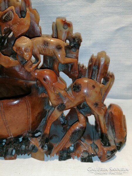 Larger antique soapstone carving with animals