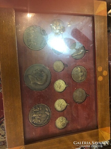 Coin collection from the 1920s, framed, for collectors.
