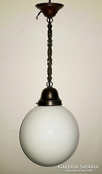 Old ceiling lamp with milk glass sphere shade