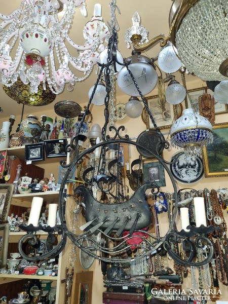 Old renovated wrought iron chandelier