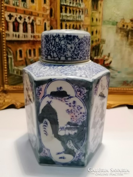 Painted oriental porcelain teapot with lid