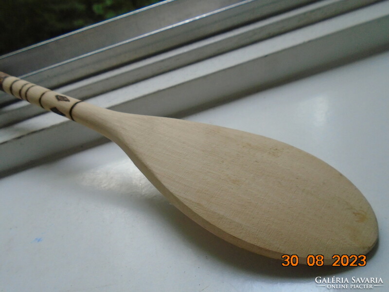 Decorative wooden spoon carved with a Vác pyrograved landscape