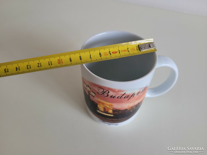 Retro old souvenir mug with the inscription Budapest Hungary with a picture of a chain bridge