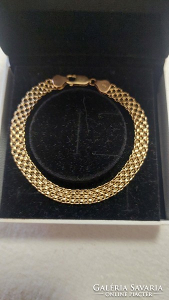 14 carat decorative gold bracelet weight 5.64 grams! Barely used!