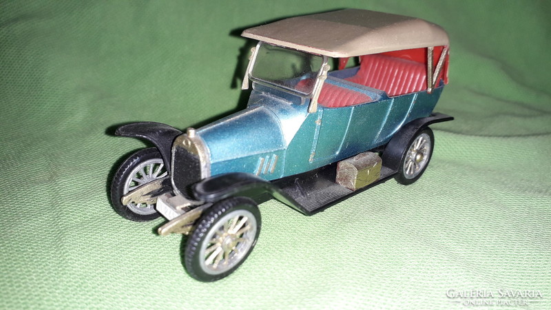 Oldtimer toy model car with old metal body and plastic in good condition 12 cm according to the pictures