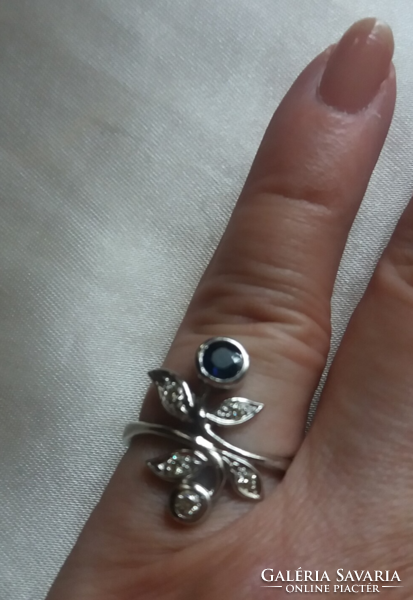 My bud gold ring with blue sapphire and glasses. With certificate