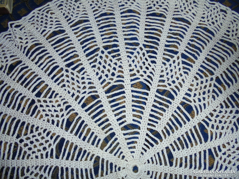 Old crocheted round tablecloth