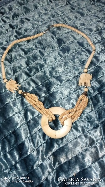 Old women's necklace with bone eyes, oriental style jewelry