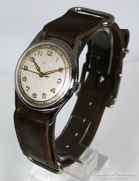 Vintage military watch from the 1940s, with a mechanical movement! With Tiktakwatch service card!