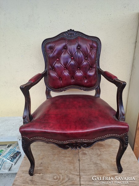 Cute neo-baroque leather armchair
