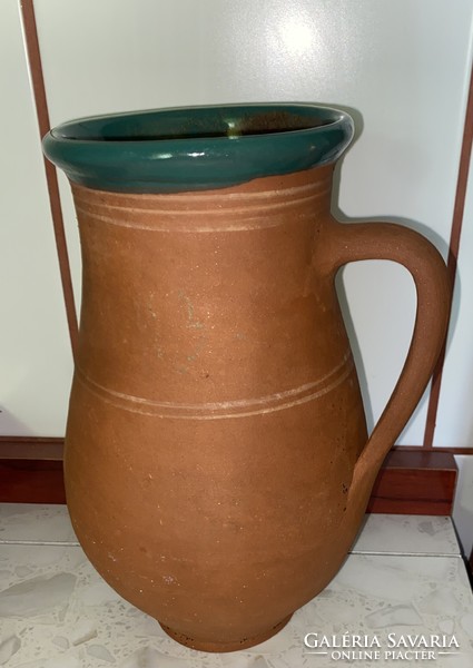 Handmade 23 cm high folk ceramic jug with glazed mouth and interior