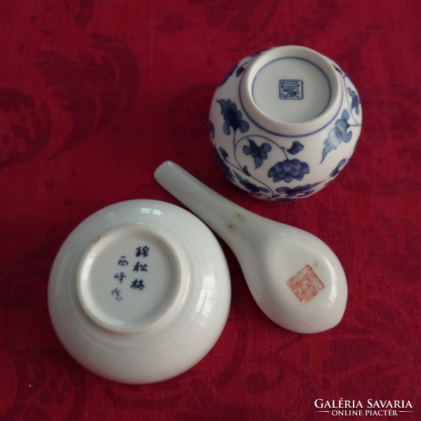 Oriental porcelain bowls with spoons