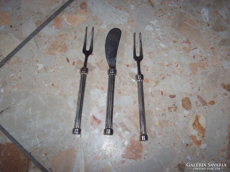 Butter knife 2 forks and 3 spoons together