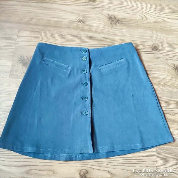 L-shaped mini skirt with buttons