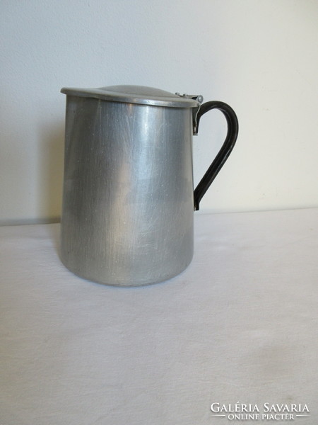 Old. Aluminum large spout with metal handle. Negotiable!