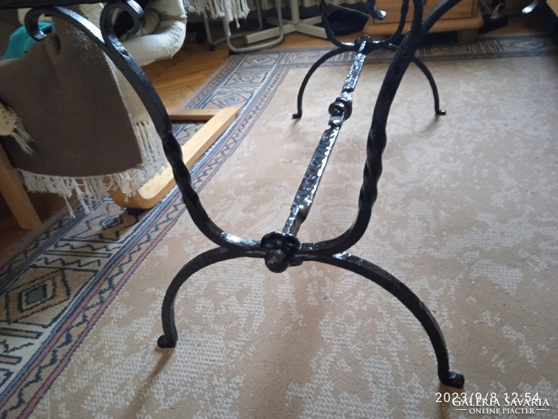 Wrought iron table with glass top